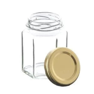 Hexagon honey jar 110ml with gold lid for storage and preservation.