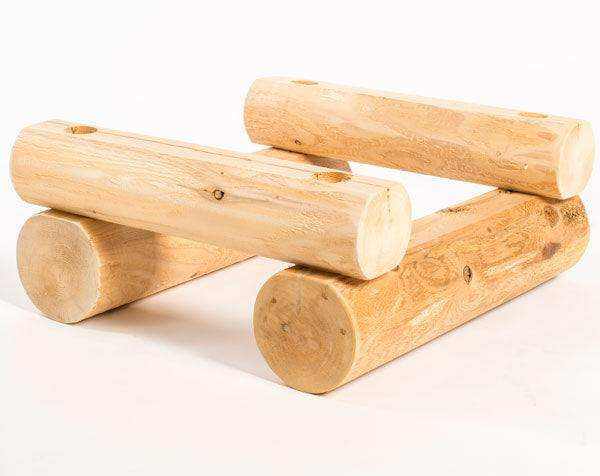 Cedar log bee hive stand for sturdy, elevated beekeeping setup.