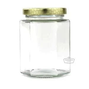 Premium 280 ml hexagon glass honey jar with black lid, elegant and functional storage solution.