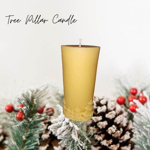 Beeswax Tree Pillar candle with decorative trees and natural honey scent.