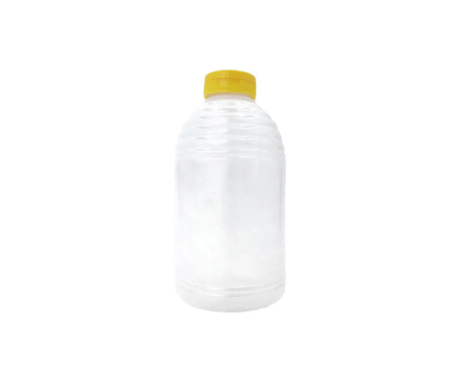 Clear plastic honey jar with honeycomb design and yellow lid, 500g capacity.