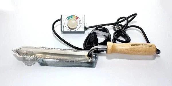 Pierce Electric Uncapping Knife with heat control, stainless steel blade, and wooden handle.